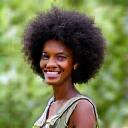 Professional headshot of Dr. Amina Khan, a wildlife biologist.