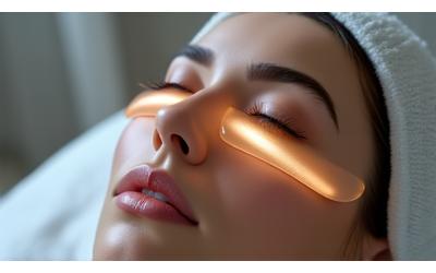 A person receiving a high-tech facial treatment